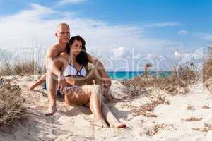 Affectionate young couple on the beach