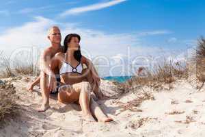 Affectionate young couple on the beach