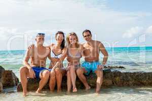 young happy friends havin fun on the beach