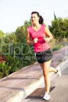 Caucasian woman practicing jogging in the park
