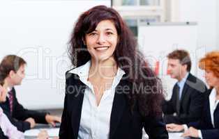 professional successful business woman in office smiling