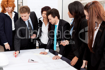 business team looking architecture project