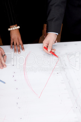 business people discussing architecture plan sketch