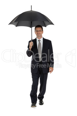 mature attractive business man with umbrella isolated