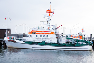 Cabin cruiser moored in the harbour