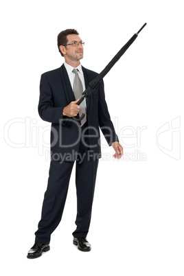 mature attractive business man with umbrella isolated