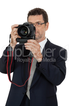 adult man photographer with digital camera dslr isolated