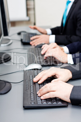 male hand on keyboard typing and scroll mouse