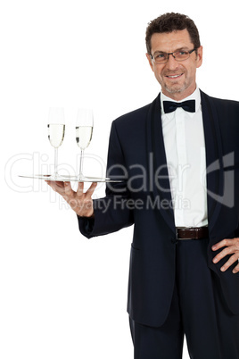 adult male waiter serving two glass of champagne isolated