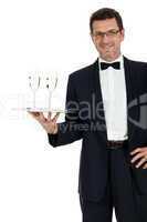 adult male waiter serving two glass of champagne isolated