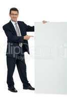 mature smiling businessman holding billboard copyspace isolated