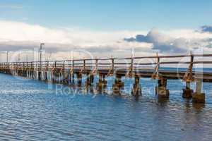 Bridge or pier across an expanse of sea