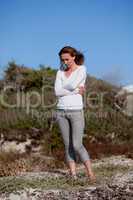 beautiful woman relax in summer outdoor in wind dune beach