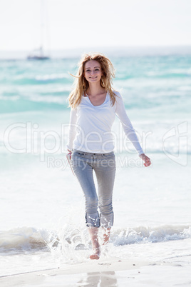 beautiful young woman relaxing at beach in summer