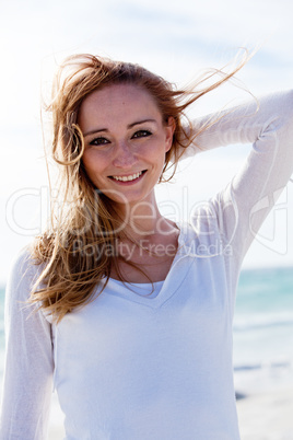 beautiful young woman relaxing at beach in summer