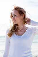 beautiful young woman relaxing at beach in summer