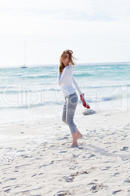 beautiful young woman relaxing at beach in summer