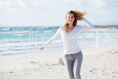 beautiful young woman relaxing at beach in summer