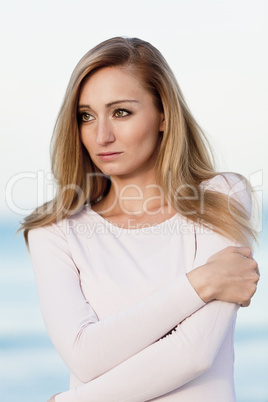 beautiful blonde woman portrait on the beach