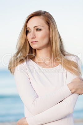 beautiful blonde woman portrait on the beach