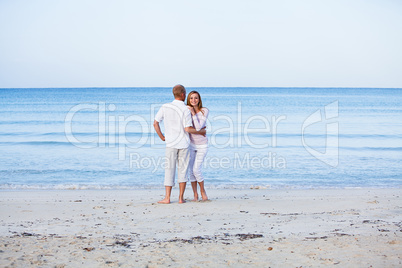 happy couple in love having fun on the beach happy couple in love having fun on the beach