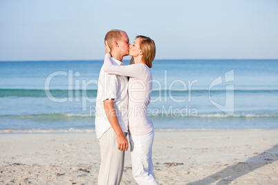 happy couple in love having fun on the beach