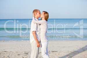 happy couple in love having fun on the beach