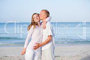 happy couple in love having fun on the beach