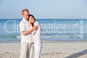 happy couple in love having fun on the beach