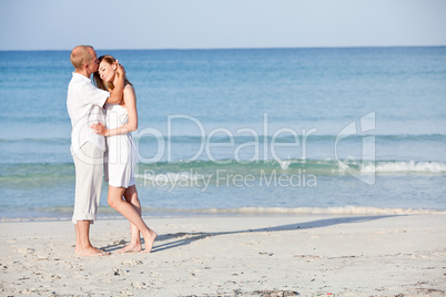 happy couple in love having fun on the beach