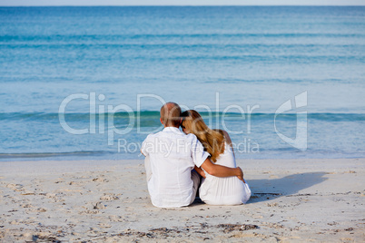 happy couple in love having fun on the beach