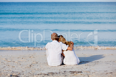 happy couple in love having fun on the beach