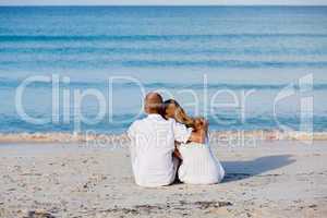 happy couple in love having fun on the beach