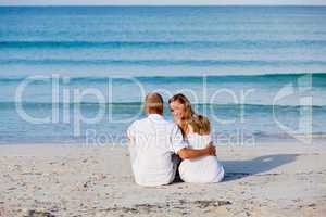 happy couple in love having fun on the beach