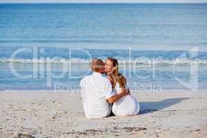 happy couple in love having fun on the beach