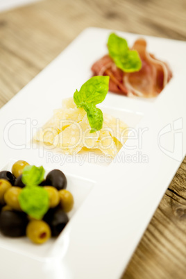 deliscious antipasti plate with parma parmesan olives