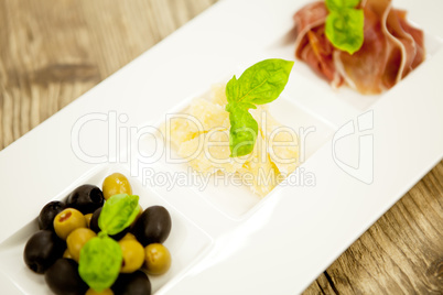 deliscious antipasti plate with parma parmesan olives