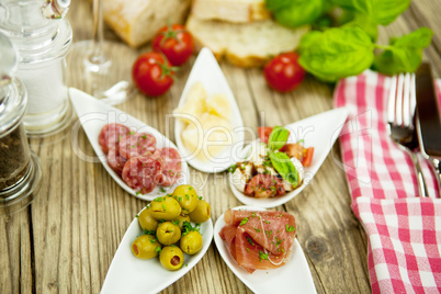 deliscious antipasti plate with parma parmesan olives