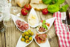 deliscious antipasti plate with parma parmesan olives