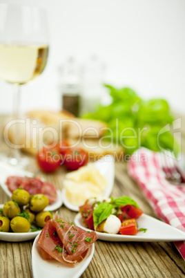 deliscious antipasti plate with parma parmesan olives