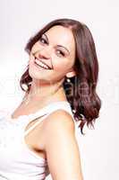 beautiful young brunette woman with big smile