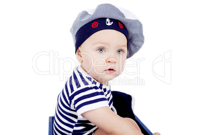 cute little baby in sailor fashion playing