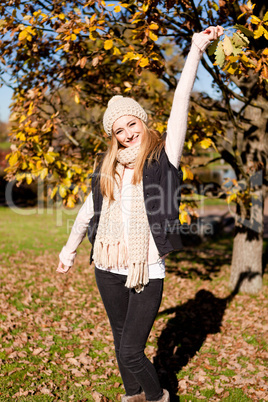 young woman in autumn sunshine outdoor