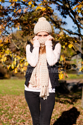 young woman in autumn sunshine outdoor