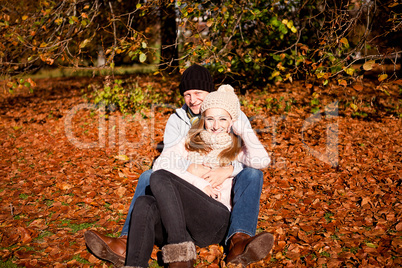 happy young couple smilin in autumn outdoor