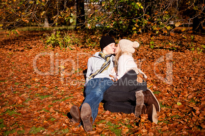 happy young couple smilin in autumn outdoor