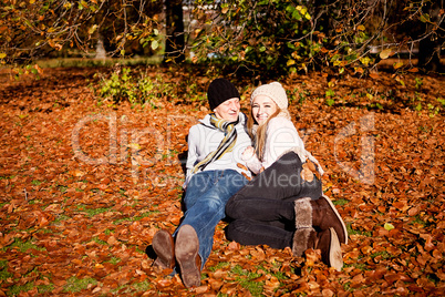 happy young couple smilin in autumn outdoor