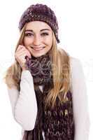 Beautiful female model wearing beanie and scarf