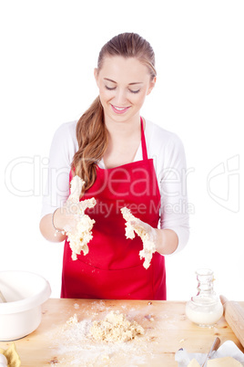 beautiful woman is baking cookies for christmas