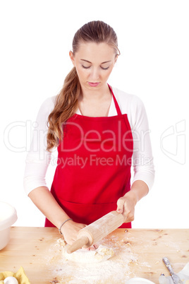 beautiful woman is baking cookies for christmas